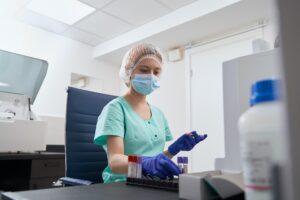 Female in medical suit working in the hospital